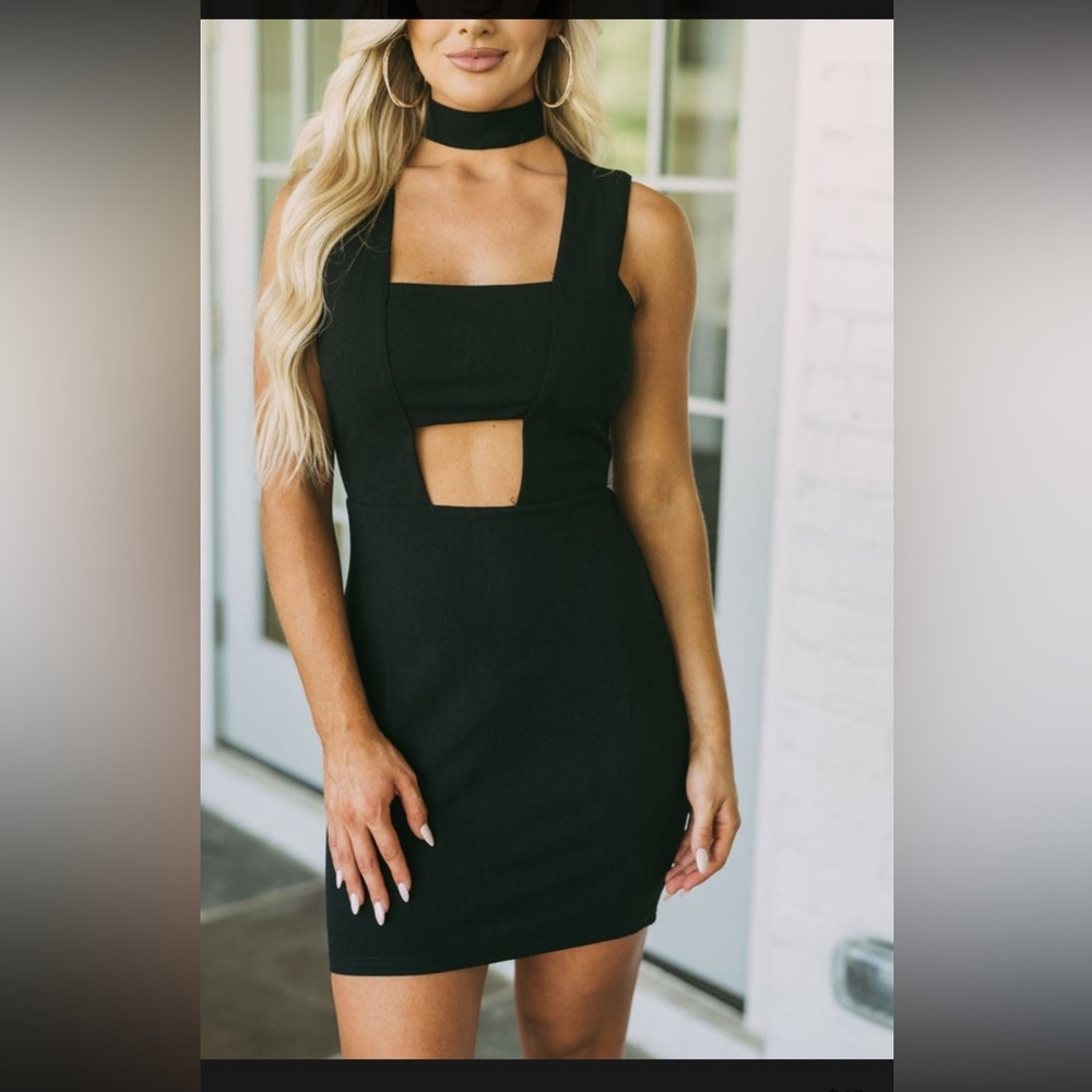 Ladies size Small mock neck cut-out dress. Size Small.